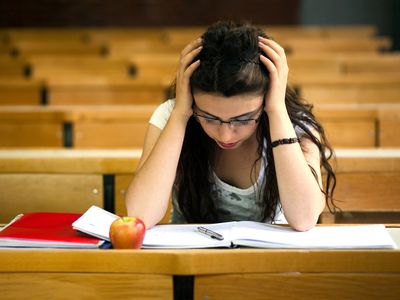 Stressed out student taking exam