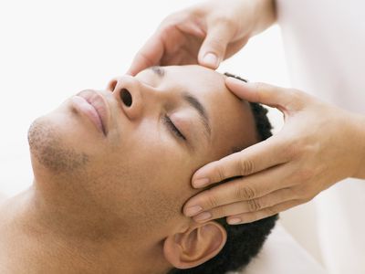 Man receiving facial massage