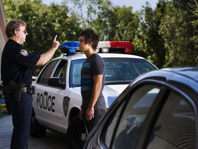 Policeman and Young Driver