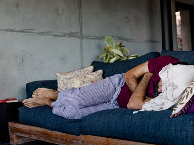 Man sleeping on couch