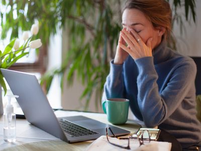 women tired at her desk