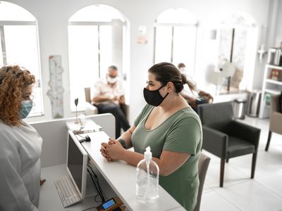 person waiting in line at a clinic