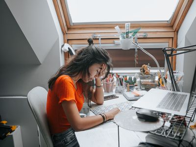 Stressed woman working at her computer