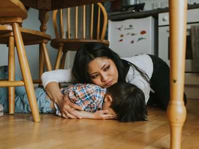 woman comforting a child