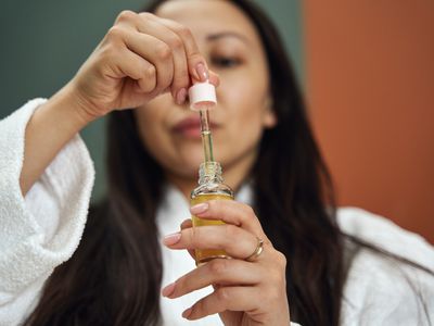 woman using essential oils