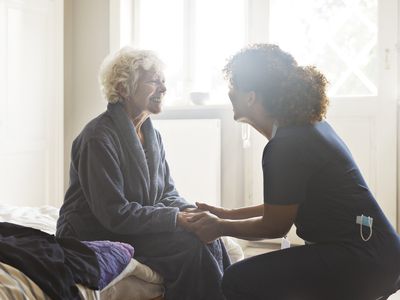 patient and doctor in bedroom