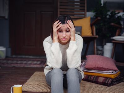 sad woman on the steps