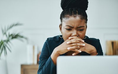 woman looking at computer screen