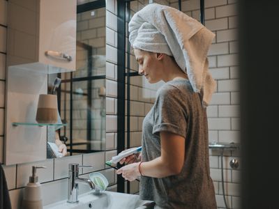 Woman night routine in bathroom 