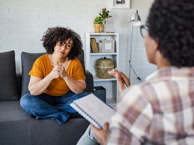 person on the couch talking to their therapist