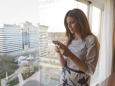 Woman looking at cell phone