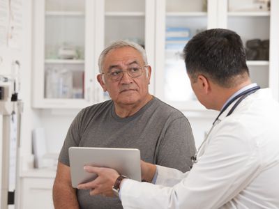 Man talking to a doctor at a hospital