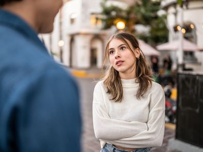 Young couple having an argument outdoors