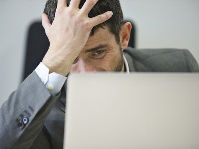 Young businessman looking stressed