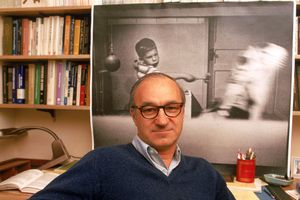 psychologist Albert Bandura sitting in offie