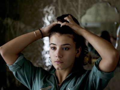 Young Woman doing her hair