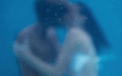 Soft Focus photo of young couple kissing, embracing under water, Underwater love, together forever, Falling in Love