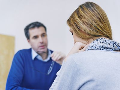 therapist talking to woman