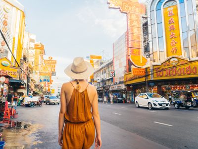 Young woman walking in Chinatown