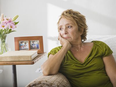 sad woman on the couch