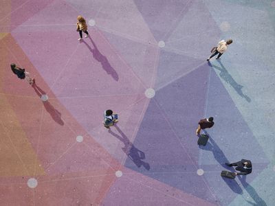 Top view of people walking in different directions of pattern