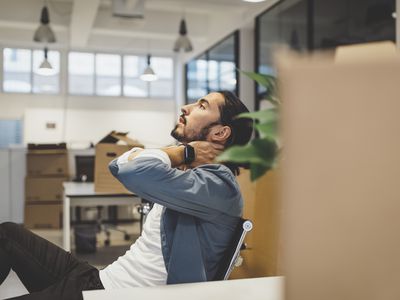 young businessman stressed while sitting in the office