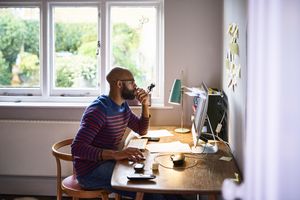 Man working at home on computer