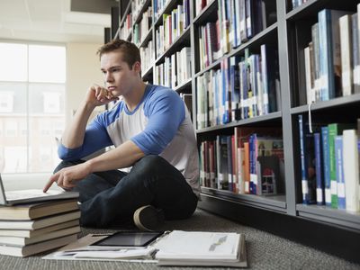 student in library