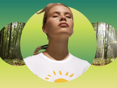 Woman meditating against forest backdrop