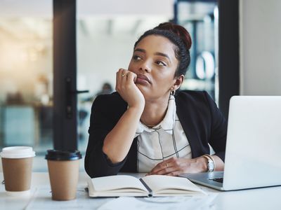 Business woman sitting at her desk