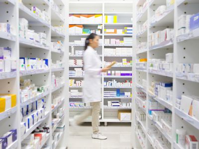 A crowded pharmacy storage area.