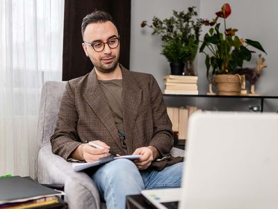 Male psychiatrist in online therapy session with his patient about eating disorders