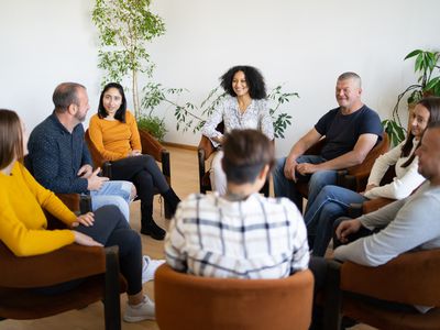 A therapy group having a discussion