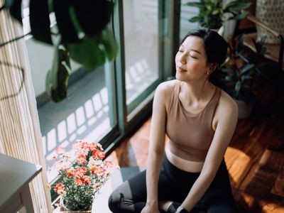 Active young woman taking a break and relaxing