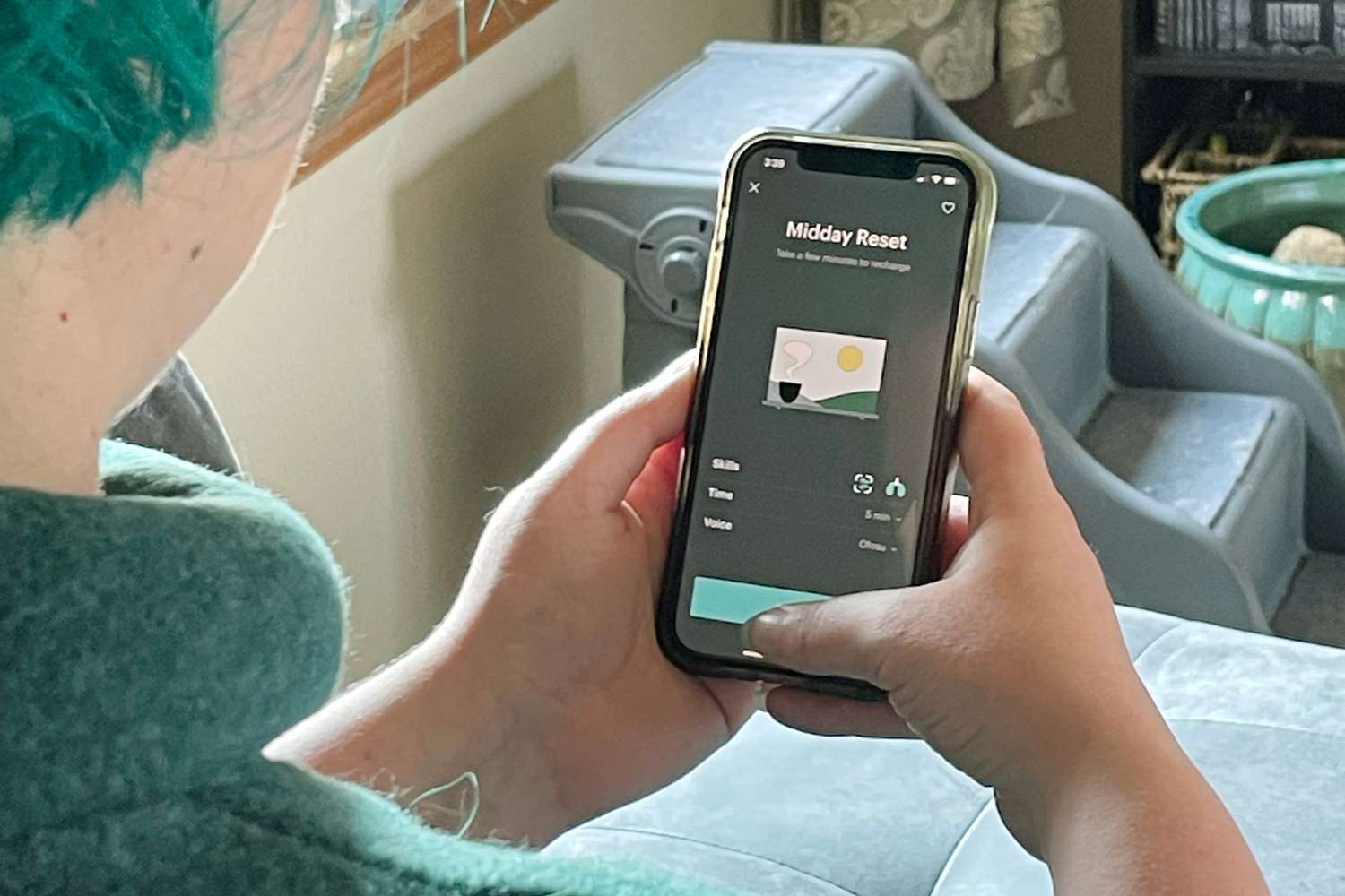 An individual using the Balance App in a home setting