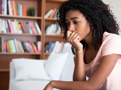 Young girl feeling alone and solitude at home