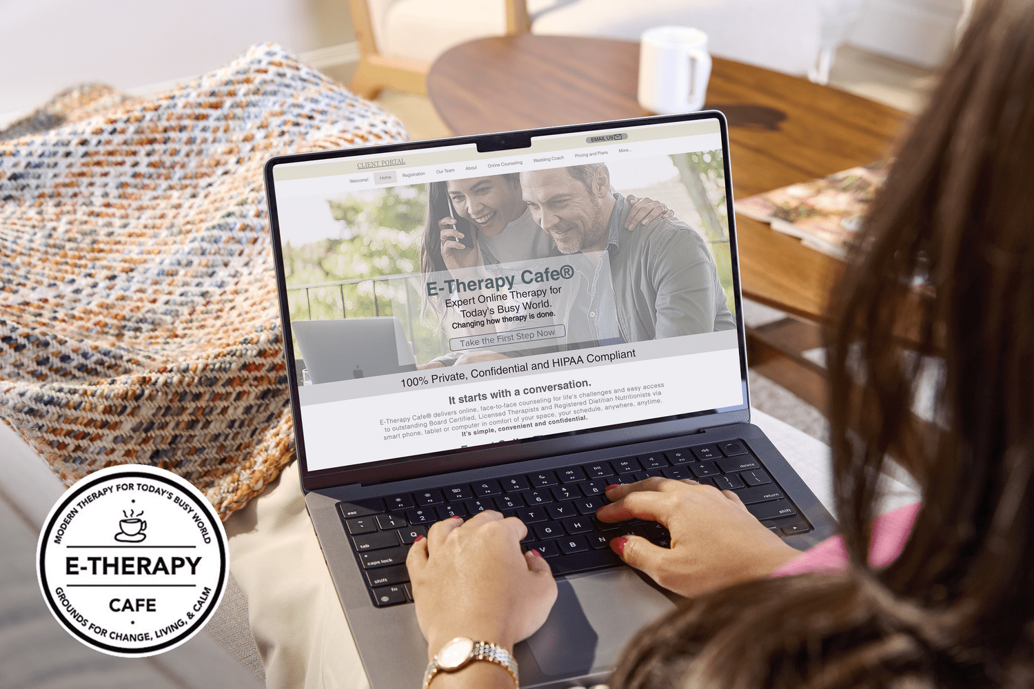 Person using laptop on E-Therapy Cafe